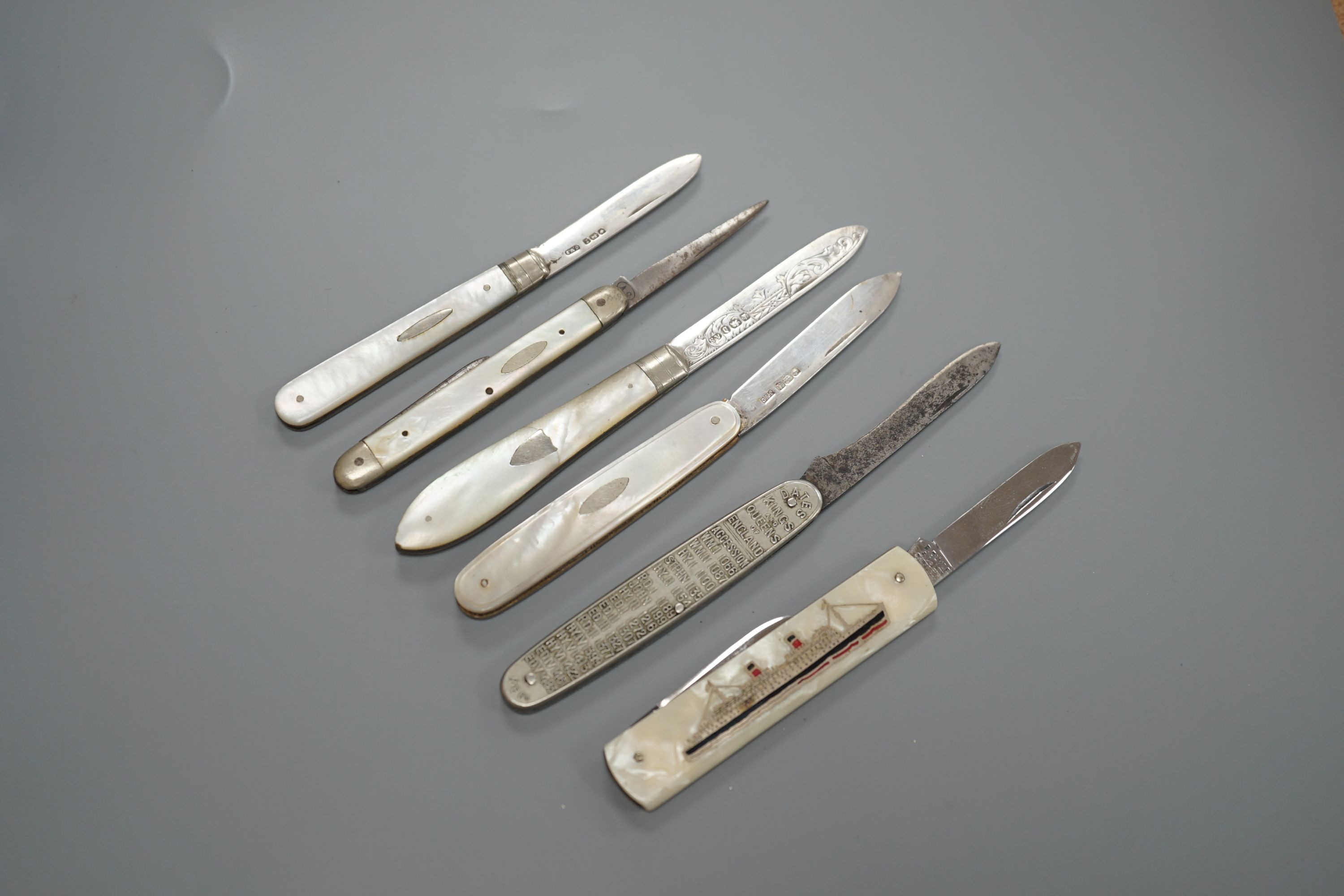 Three assorted mother of pearl mounted silver bladed fruit knives, one other penknife and two commemorative pocket knives.